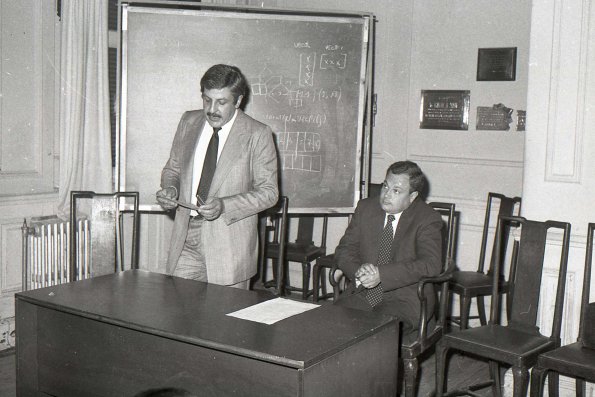 pugiese y nicolini en una charla
